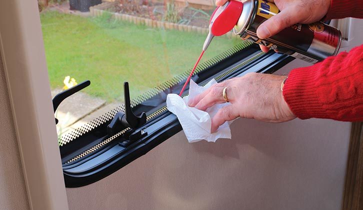 Silicone lubricant being sprayed where the window has stuck