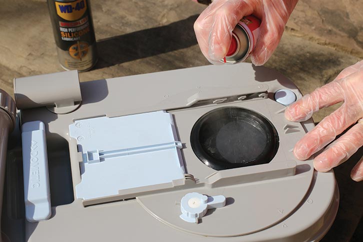 The toilet blade being sprayed