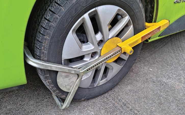 A wheel clamp in place