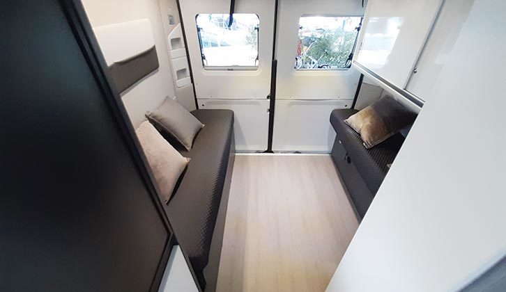 Rear lounge seating is restricted by the large cupboard to one side