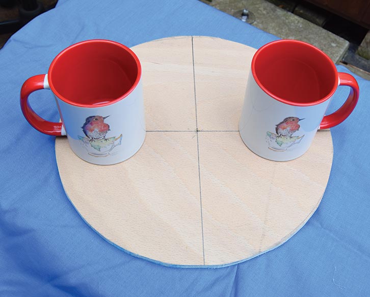 Using mugs to mark out the templates