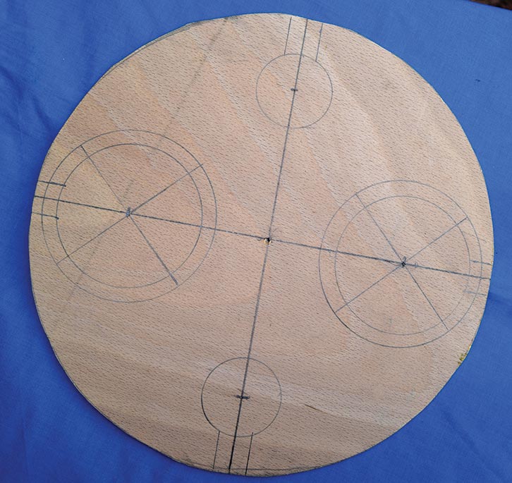 Cutting dimensions marked up for the upper plywood disc