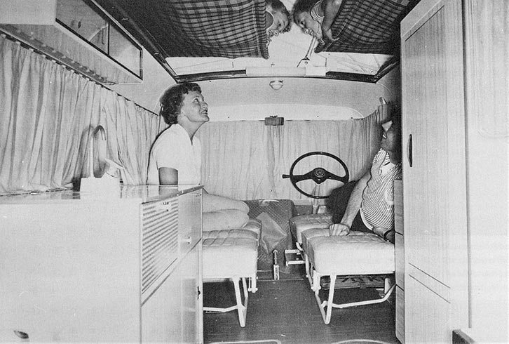 A family in a later one-piece windscreen model