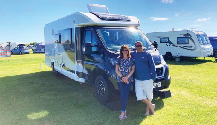 Paul and Carmelina, standing in front of the Bailey motorhome