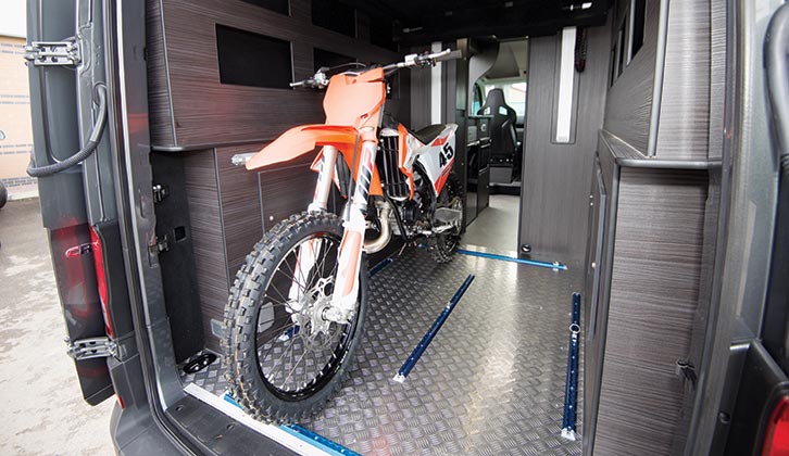 A motorhome in a garage