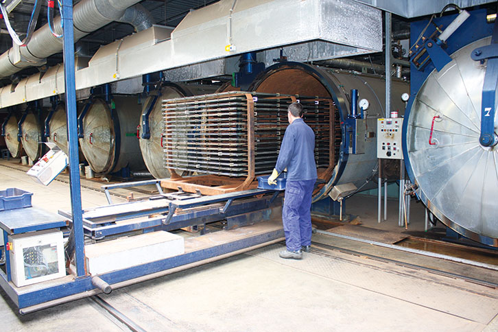 Acrylic sheets are cured in huge autoclaves, then removed for cooling