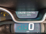 The dashboard displaying cruise control