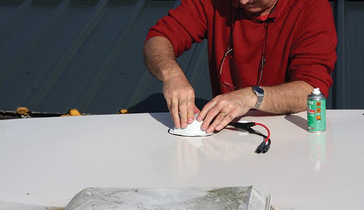 Securing the housing to the roof