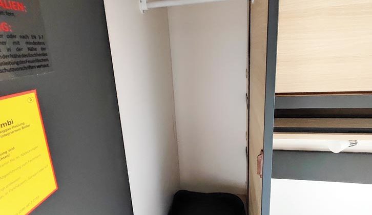 A wardrobe with hanging rail