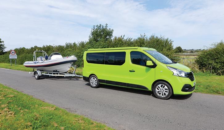 Motorhome towing a boat