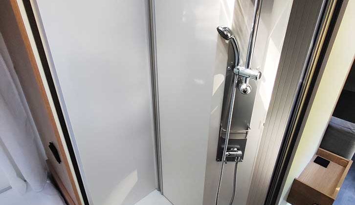 Shower cubicle with two drain holes