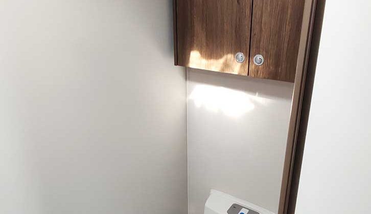 Toilet in corner washroom