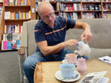 Man pouring tea