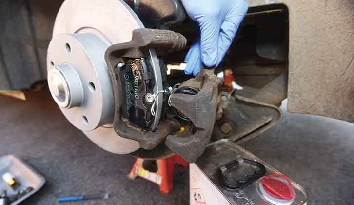 Pads fit into caliper carrier