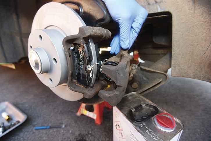Pads fit into caliper carrier