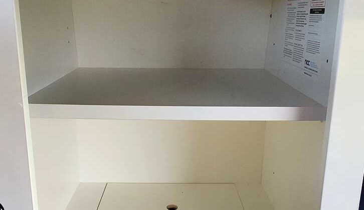 Tambour-door cupboard with two shelves