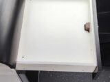 Drawer above fridge