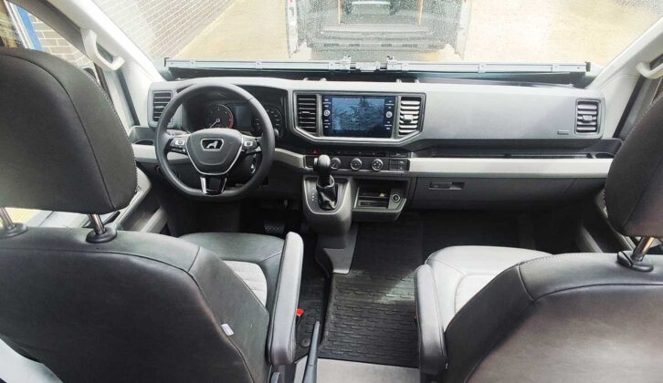 Cab area with leather steering wheel