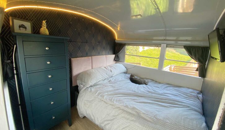 Double bed at rear of bus conversion