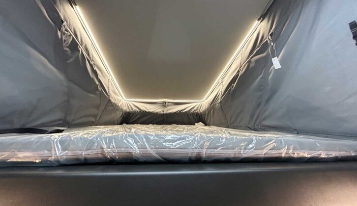 Upstairs bed with night-time lighting