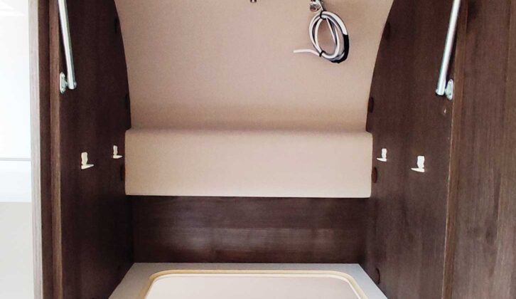 The wardrobe over the bed