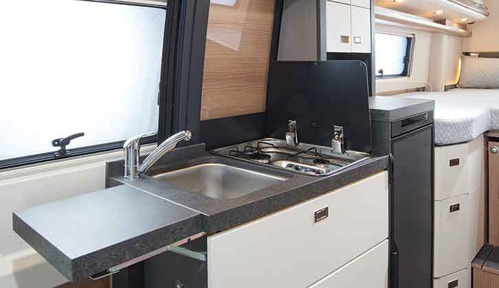 The kitchen with its hob, sink and worktop