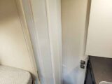 The shower cubicle sealed off with a screen