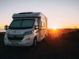 A Hobby motorhome as the sun sets in the background