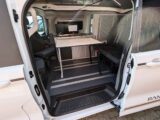 A clip-on table in the 'van