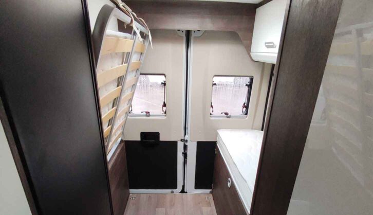 The folding beds at the rear of the Benimar Benivan 144