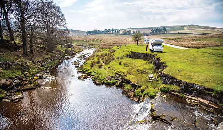 A 'van pitched up by water