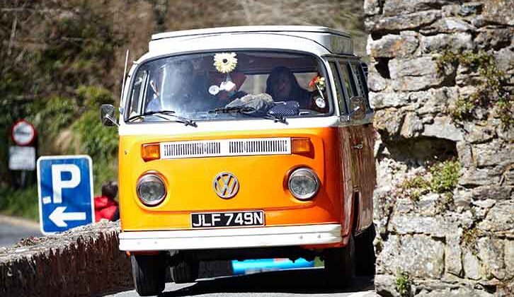 A campervan on a narrow road