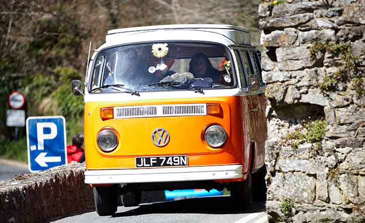 A campervan on a narrow road