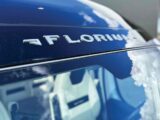 The Florium logo on a campervan