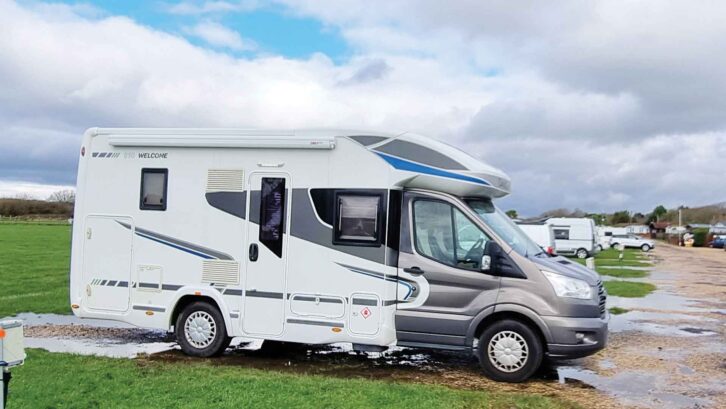 A motorhome pitched up at a campsite