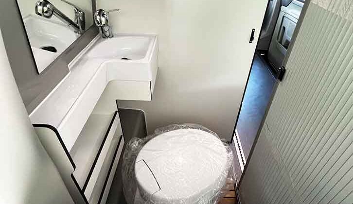 The Thetford cassette toilet and rectangular sink in the washroom