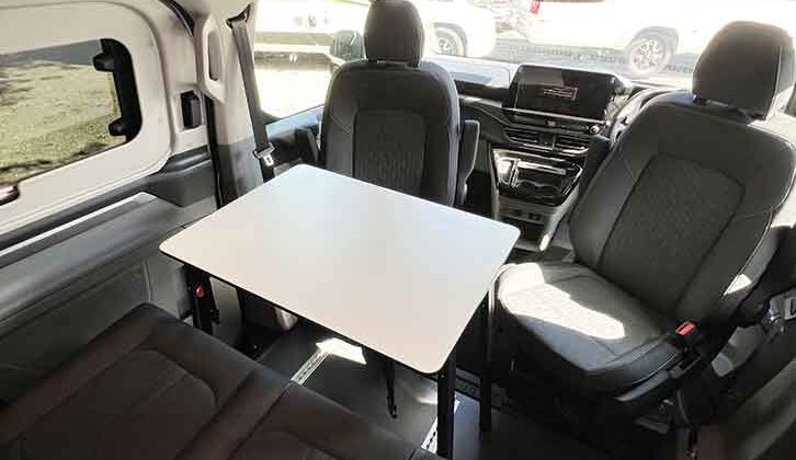 The cab seats swivelled to face the travel seats