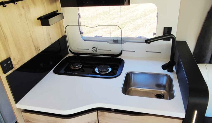 The kitchen has plenty of work surface