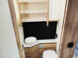 The toilet, handbasin and mirror