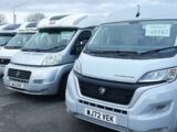 Vans on a dealer forecourt