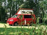 A red campervan at Silver Sands