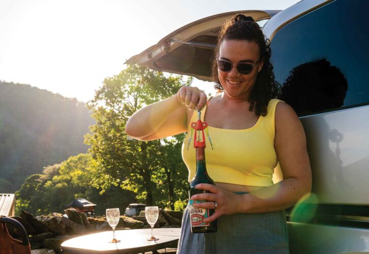 Using a corkscrew to open a bottle