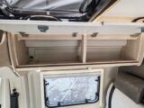 The overhead lockers in the louge