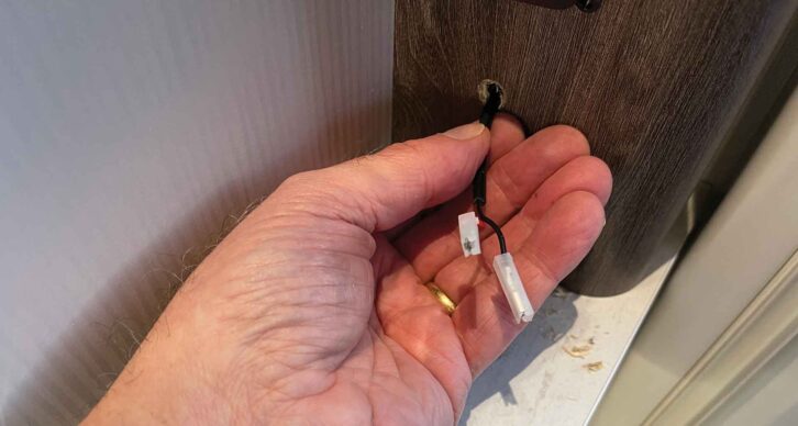 Feeding the lead through the hole