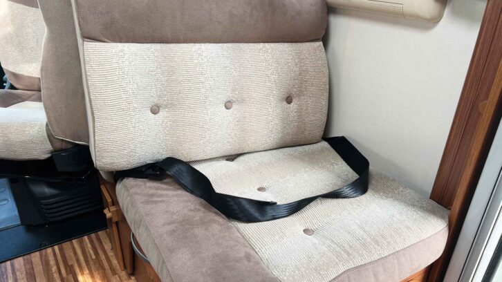 A rear-facing seat with a lap belt
