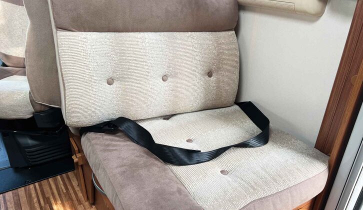 A rear-facing seat with a lap belt