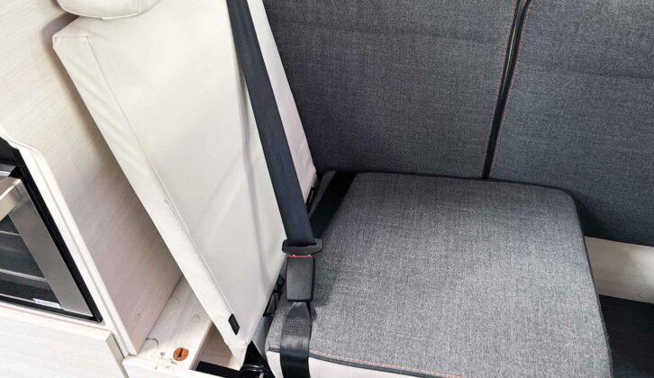 A side-facing seat changed to a forward-facing seat for travel