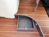 The small drawer in the step