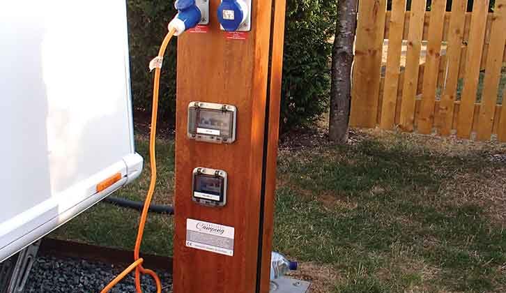 A hook-up post with two sockets, one of which is in use