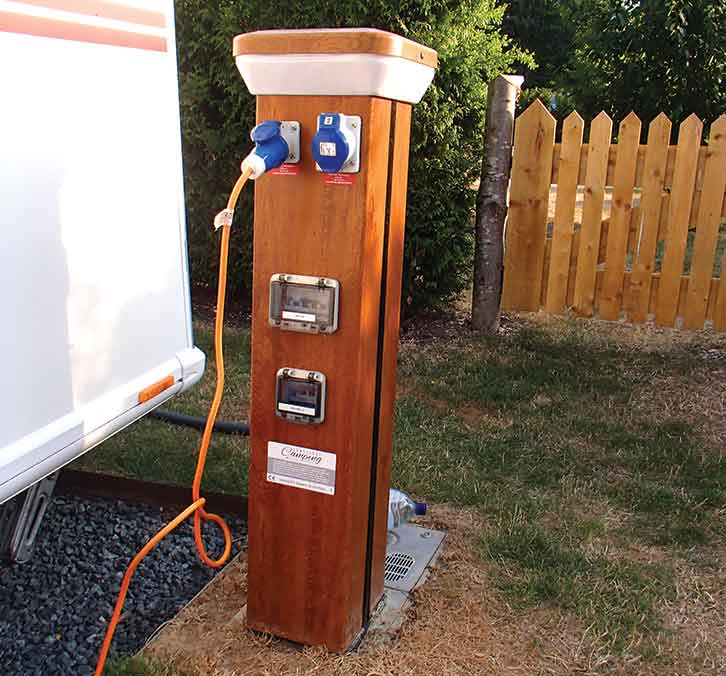 A hook-up post with two sockets, one of which is in use
